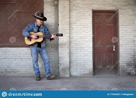 Browse 12,705 blues guitar stock photos and images available, or search for blues guitar player to find more great stock photos and pictures. Man Wearing Cowboy Hat, Blue Jeans Playing Guitar On ...