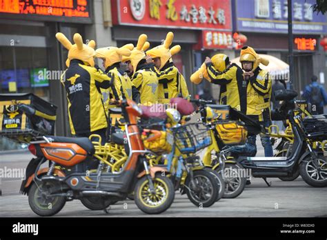 Couriers Of Chinese Online Food Delivery Company Meituan Put On