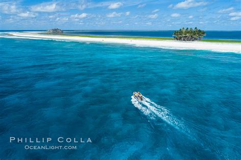 Dive Boat Passes Over Coral Reef At Clipperton Island In The Eastern