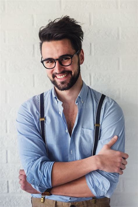Portrait Of Handsome Bearded Hipster Guy With Glasses On Stock Photo