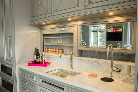 Or that you can lock the screen? Gray Wet Bar with Built In Beer Tap and Sliding Backsplash ...