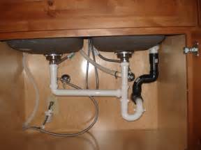 For a freestanding sink, code might allow a loop vent. I recently had a mini-vent insatlled in my kitchen sink ...