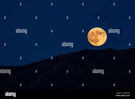 Usa Idaho Bellevue Full Moon Rising Over Hills Stock Photo Alamy