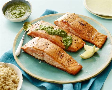 Poach whole salmon in a fish poacher and then cover it with an elegant arrangement of citrus or cucumber slices before coating with aspic. Pan Seared Salmon with an Herb Pesto Vinaigrette - What's ...