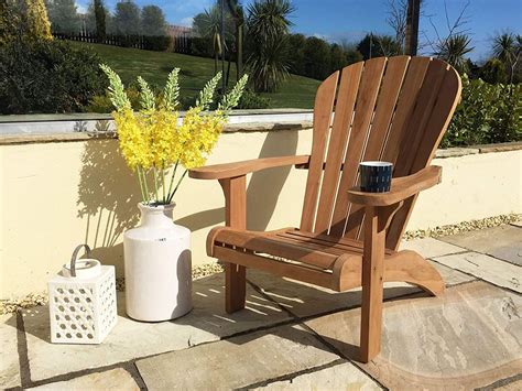 The adirondack chair is a reclined chair with a backward sloping seat and back that sits close to the ground. Best Adirondack chairs | Real Homes