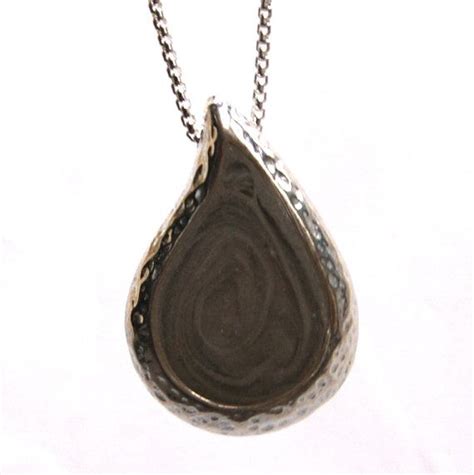Stardust memorials offers necklaces for ashes in a wide range of styles, shapes and themes, so you are sure to find something that is beautiful and browse our selection of wearable memorial jewelry to find the perfect item to remember your loved one. Textured Teardrop Cremation Necklace, 30 x 20mm - Sterling ...