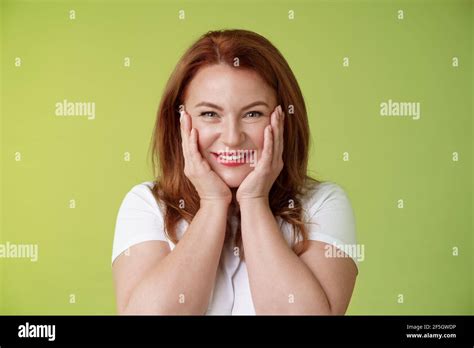 Happy Delighted Cheerful Lucky Redhead Middle Aged Caucasian Woman Blushing Joyfully Receive