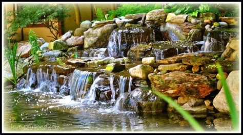 Waterfall Display Into A Koi Pond Designed And Installed By Full