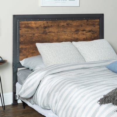 Metal headboards are not a common concept, but for a contemporary home or one with an industrial motif, perhaps it is just what you seek. Industrial Wood & Metal Panel Queen Headboard | Saracina ...