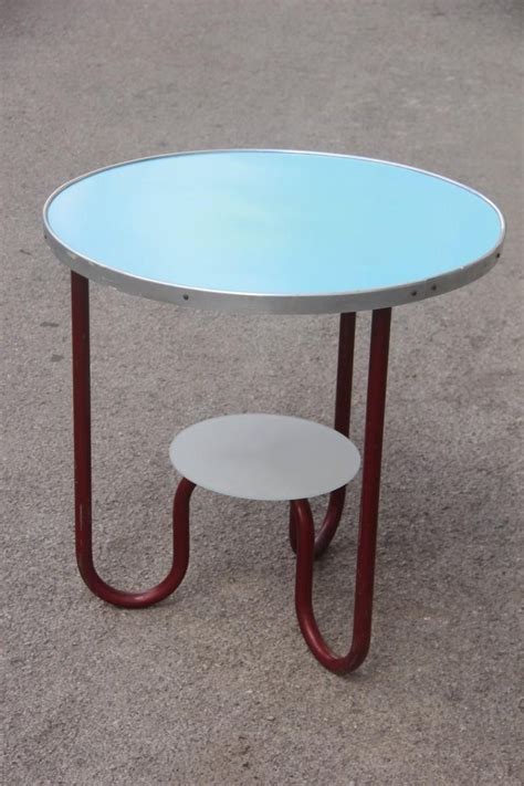 Shop for round coffee tables at cb2. Round Red Blue Bauhaus Coffee Table by Marcel Breuer ...
