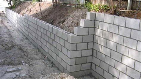 Concrete block is heavier because it contains stone and sand. Build with bricks or with concrete blocks?