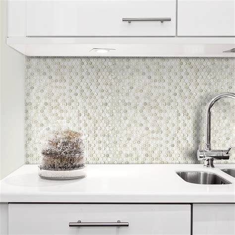 While it's more common to see penny tile in a bathroom, that doesn't mean that you can't use it in your kitchen! Jeffrey Court 3/4" Penny Round Diamond backsplash install ...