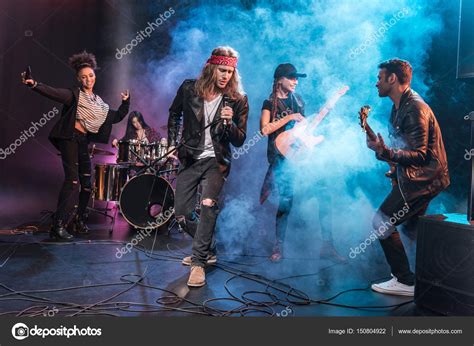 Rock Band On Stage — Stock Photo © Tarasmalyarevich 150804922