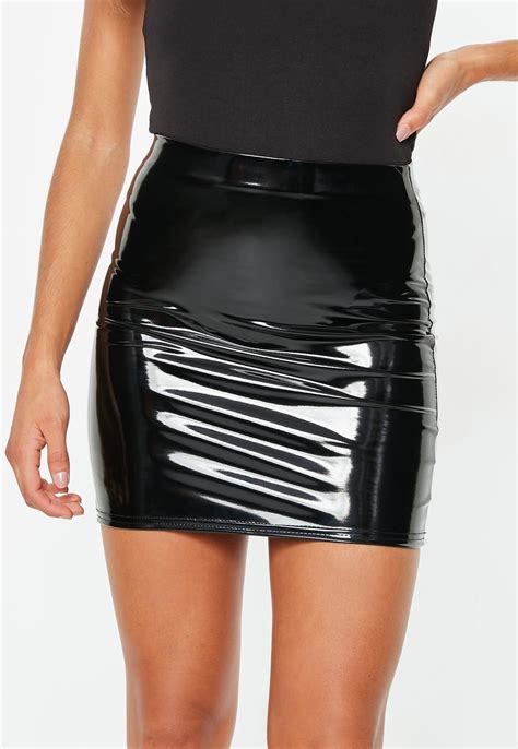 black vinyl mini skirt order today and shop it like it s hot at missguided mini skirts vinyl