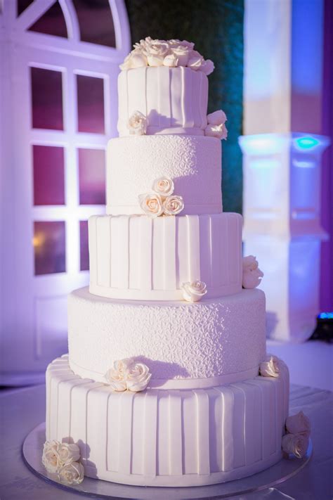 To make the middle tier just double the recipe, and for the bottom tier make sure to triple it. Simple white 5 tier wedding cake. Arranged by: Signature ...
