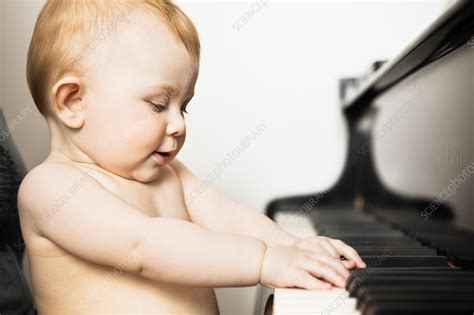 Baby Girl Playing Piano Stock Image F0053578 Science Photo Library
