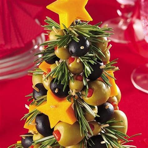 I saw a cream cheese red pepper dip that was shaped in a christmas tree. Cheese & Olive Appetizer Tree | Recipe | Olive appetizer ...