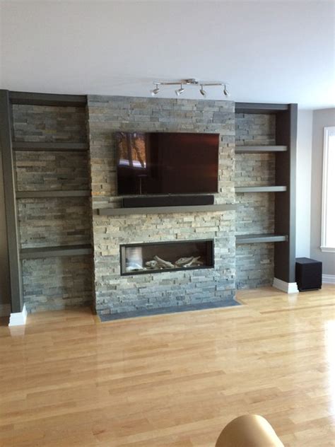 Television Above Valor Gas Fireplace With Stone Cladding Surround