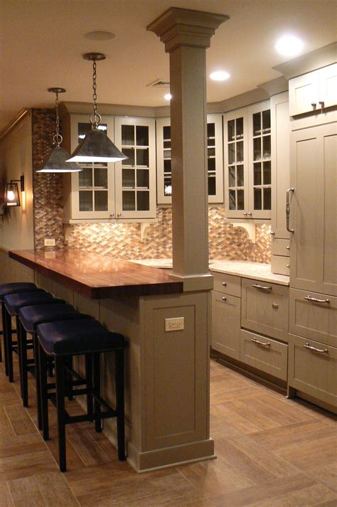 Another great design choice in the image above is the use of mirror on the backsplash. like the wood bar top and colour of cabinets and also ...