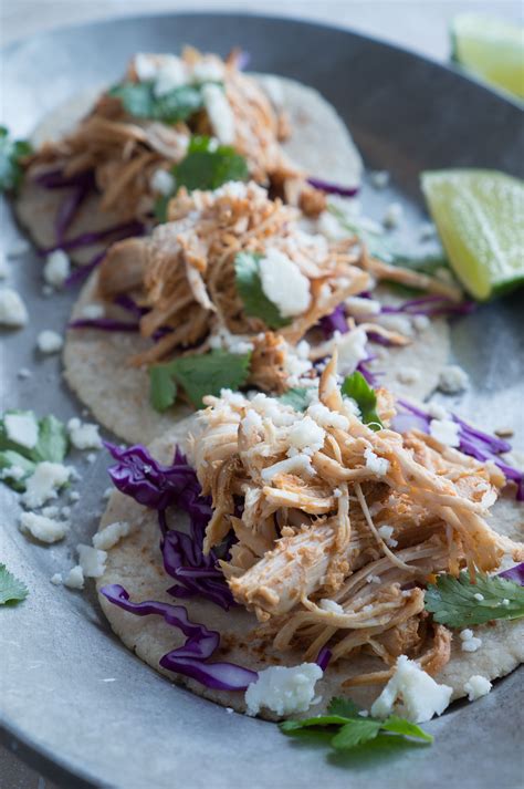Toss chicken with oil and lime: Shredded Chicken Street Tacos | Free Your Fork