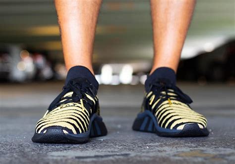 The dragon ball z x adidas eqt support mid adv. adidas Dragon Ball Z Shenron Black Gold Shoes | SneakerNews.com
