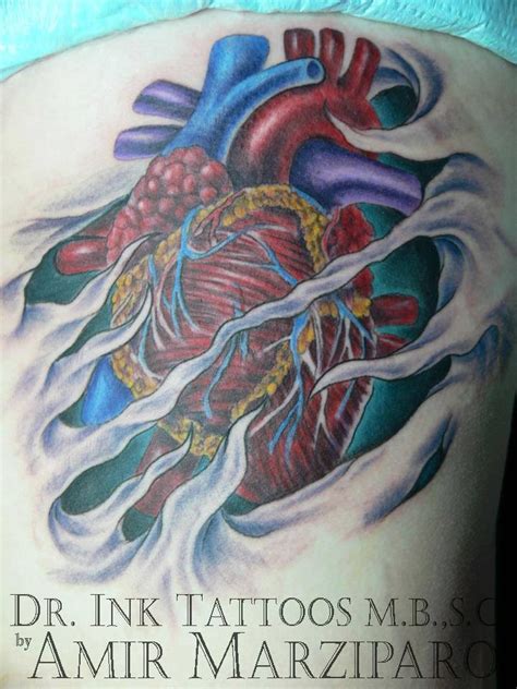 Anatomical Heart Tattoo Ripping Out Of Skin By Amir Marziparo