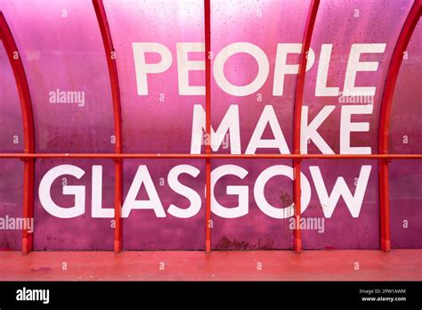 People Make Glasgow Logo Inside Smartie Tube Pedestrian And Cyclist