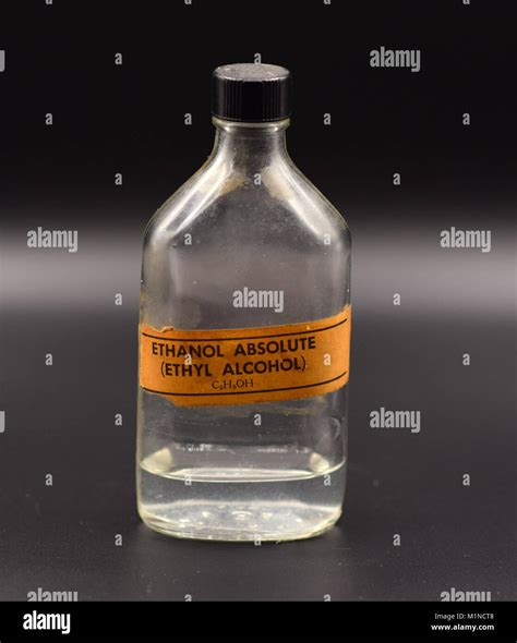 Retro Scientific Ethyl Alcohol Bottle With Orange Label On A Seamless