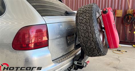 Porsche Cayenne Project Installing A Swingout Spare Tire And Gas Can Mount