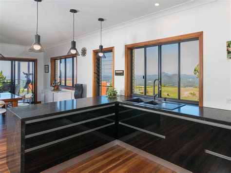 U shape modular kitchen design for residential purpose with plan, all elevations and modular kitchen cabinetry detail. U Shaped Kitchen Designs & Ideas - realestate.com.au