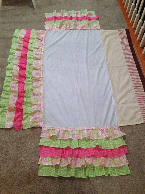 I hope you enjoyed learning how to sew a crib bedding set and you can find another great baby gift idea here. A Little Bolt of Life: DIY Ruffled Crib Skirt