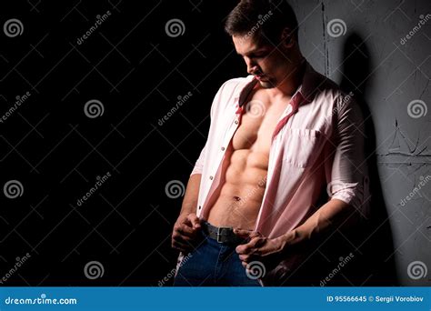 Young Man With Perfect Body Stripping Stock Image Image Of Skin