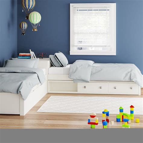 The l shaped loft bed consists of a long square frame with a protrusion at one end, creating the leg of the l. for this project, build two wooden frames attached to the wall studs of the home. Granville L-Shaped Storage Twin Panel Bed with Trundle ...