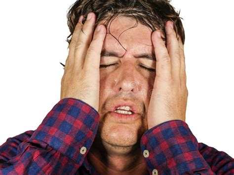 Close Up Portrait Of Stressed And Overwhelmed 30s Or 40s Man Holding