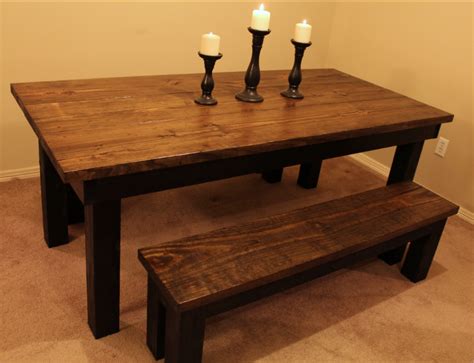 Soften a wooden table with upholstered chairs. 6 foot distressed dining table with black legs and ...