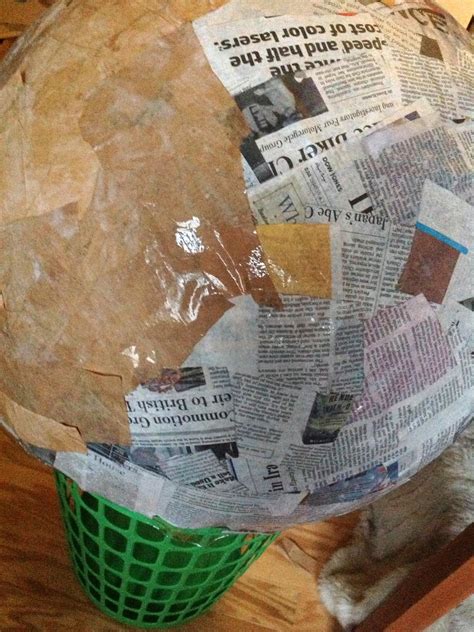 Fold it again, so that the tip of the first fold is even with the upper left corner. Kids' Halloween Costume: How to Make an Ice Cream Cone ...