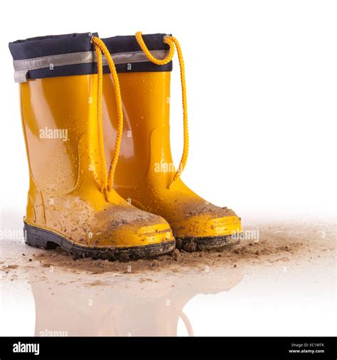 Yellow Rubber Boots For Kids On White Background Stock Photo Alamy