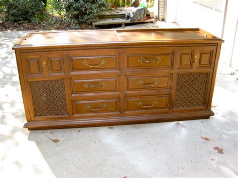 Go out to the appropriate store, buy a cabinet for your modern stereo and sell the vintage item to someone who has a feeling for the preservation of historical things, and they can preserve the item for more time. ways to repurposed stereo cabinet | just b.CAUSE