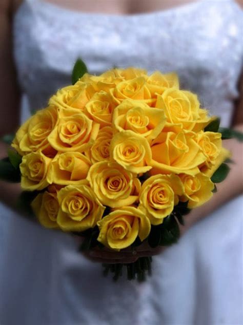 Our roses are accented with white limonium which has very subtle soft yellow blooms mixed in with the white. Yellow Rose Bridal Bouquet | Yellow Wedding Flowers