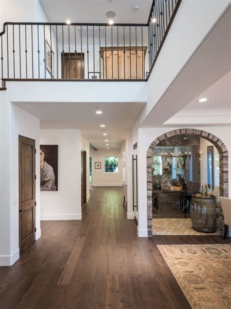 This helps the wood adjust to the moisture in the air of your home, so they can expand or contract accordingly before you start nailing them in. The hardwood flooring throughout this home is beautifully ...