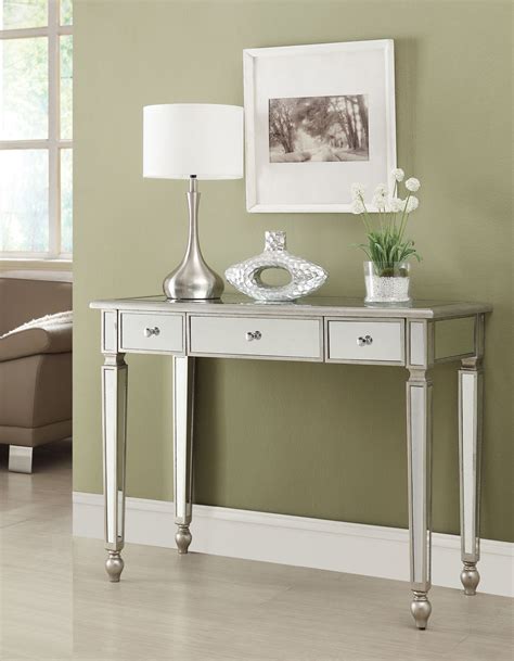 This contemporary design adds a sophisticated and understated design twist to any interior. 950014 Antique Silver Console Table from Coaster (950014) | Coleman Furniture