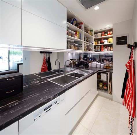 Picture of white modern kitchen cabinets with black back splash and floor. Characteristics of a Modern Kitchen Design | Wonderful ...