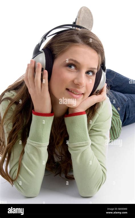 Woman Listening To Music Lying Down Stock Photo Alamy