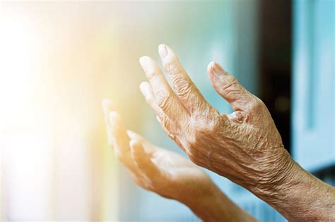 Elderly Woman Hands Praying With Peace Of Mind And Faithfully Stock