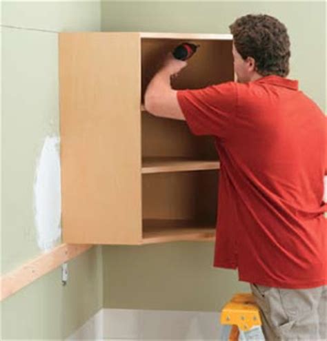 How to install base cabinets in center islands. Kitchen And Bathroom Renovation: How to Install Wall ...