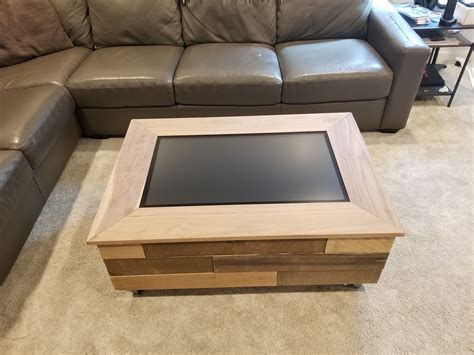 What will they think of next?! This touch screen coffee table that I made (makes for fun ...