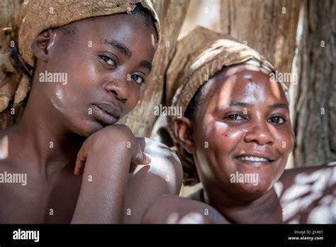 Damaran Women Sit And Pose Together In The Shade At The Damara Living Museum Located North Of