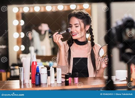 Beautiful Young Woman Applying Cosmetics On Face Stock Image Image Of