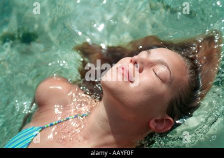 Teenage Girl In Bikini Relaxing In The Water Stock Photo Alamy
