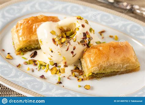 Traditional Turkish Dessert Pistachio Baklava On A White Porcelain